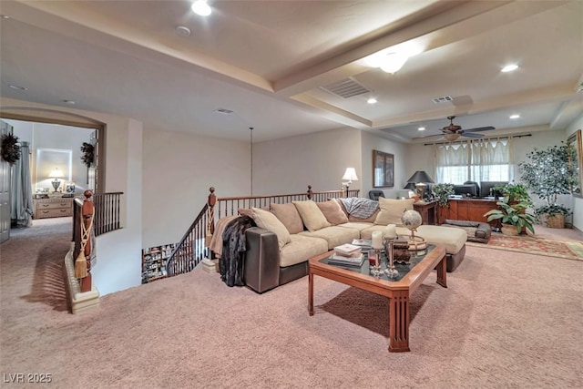 carpeted living room with a ceiling fan, recessed lighting, and visible vents