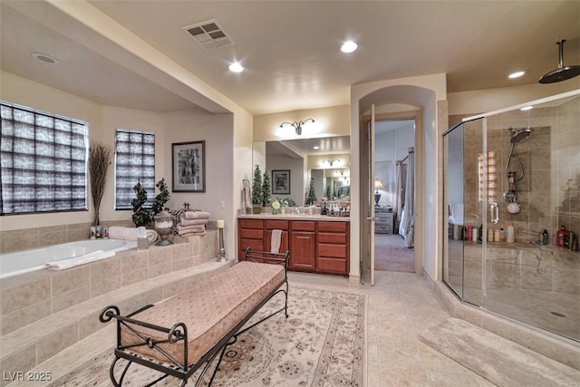 bathroom featuring tile patterned flooring, recessed lighting, vanity, visible vents, and a shower stall