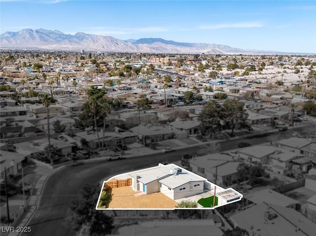 bird's eye view with a residential view and a mountain view