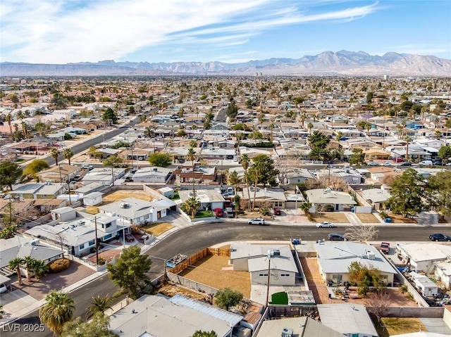 aerial view with a residential view and a mountain view