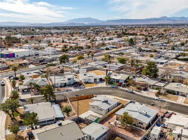 aerial view featuring a residential view and a mountain view