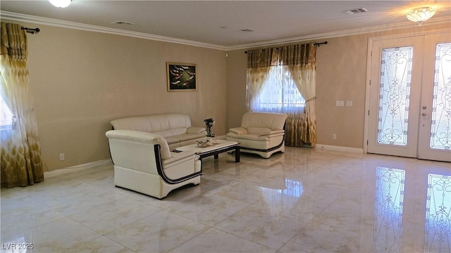 sitting room featuring ornamental molding, french doors, visible vents, and baseboards