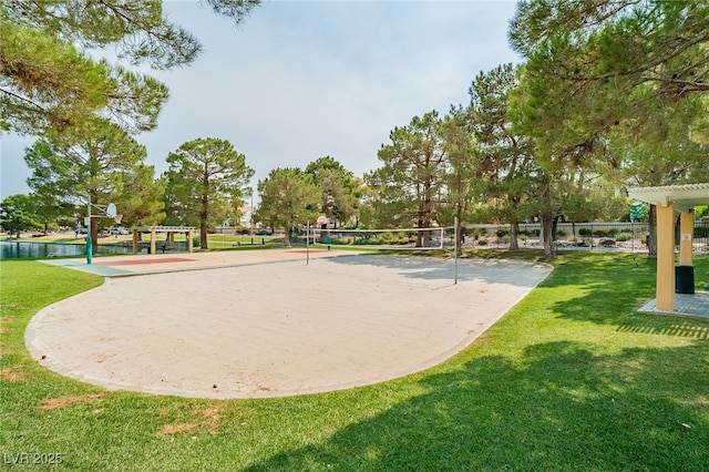 view of home's community featuring volleyball court and a yard