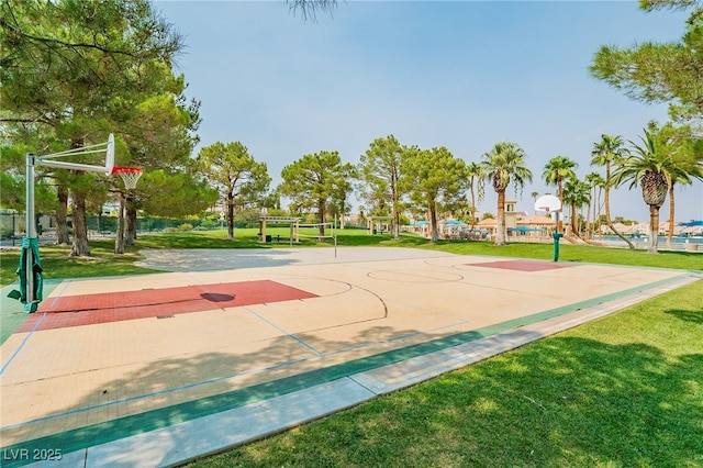 view of sport court featuring a yard and community basketball court