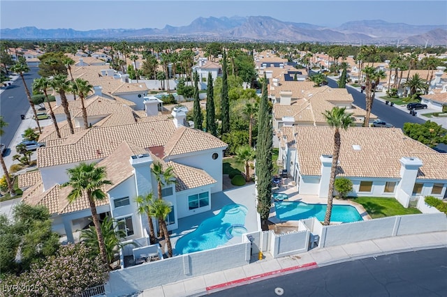 bird's eye view featuring a residential view and a mountain view