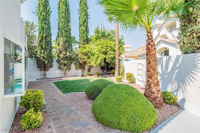 view of yard with a fenced backyard