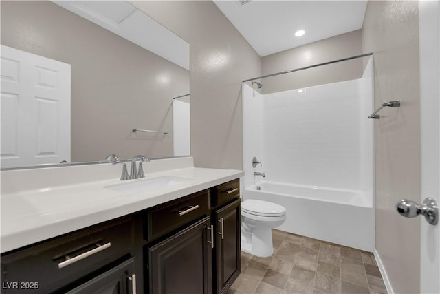 bathroom with shower / bath combination, vanity, and toilet