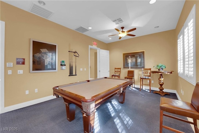 rec room with carpet, visible vents, and baseboards