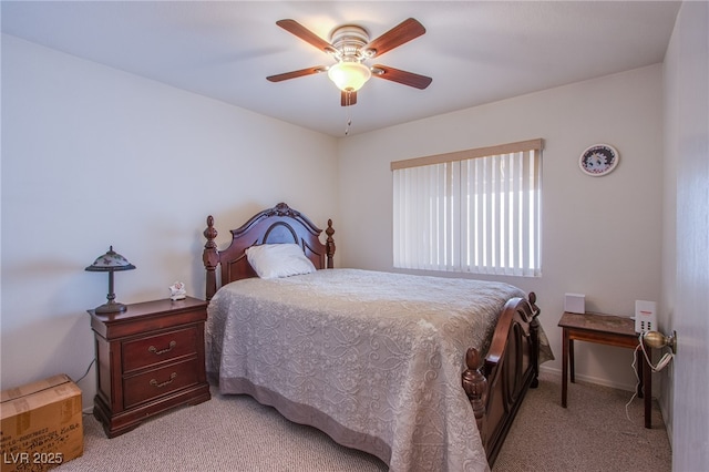 bedroom with light carpet and a ceiling fan