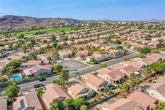 birds eye view of property with a residential view and a mountain view