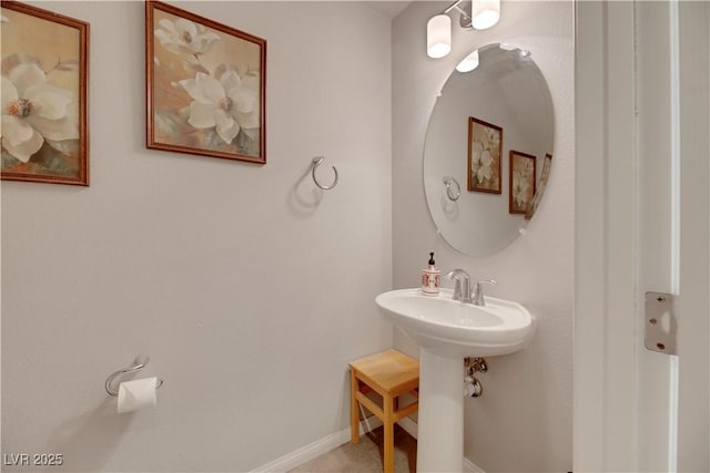 bathroom with baseboards