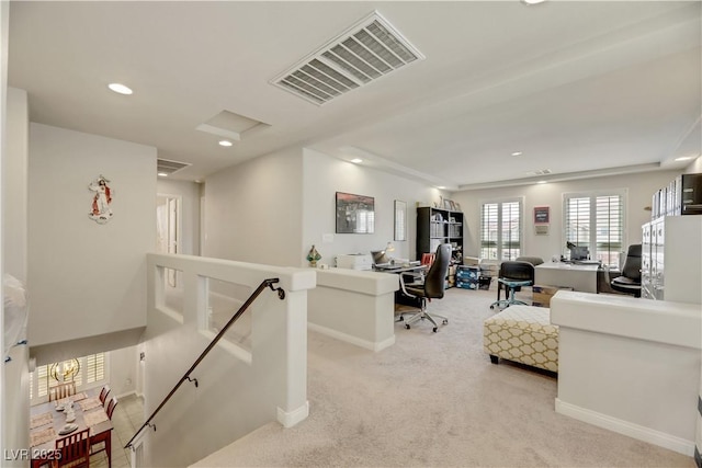 office area with recessed lighting, light colored carpet, visible vents, baseboards, and attic access