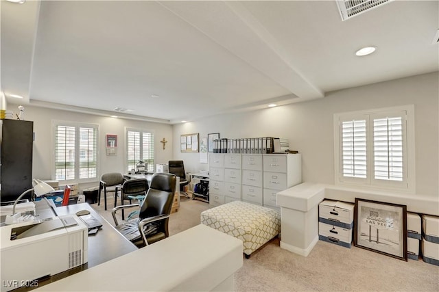 carpeted office featuring visible vents