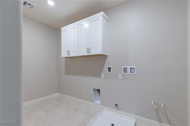 laundry room featuring washer hookup, visible vents, cabinet space, and gas dryer hookup