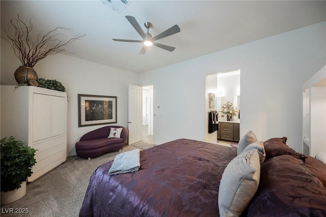 bedroom featuring a ceiling fan, carpet flooring, visible vents, and connected bathroom