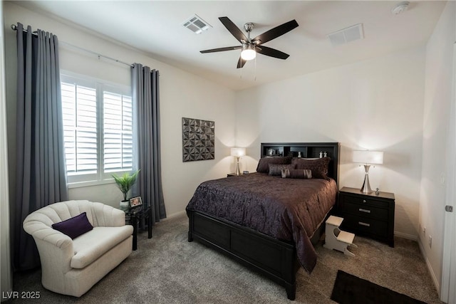 carpeted bedroom with a ceiling fan, visible vents, and baseboards