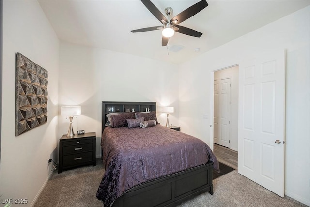 bedroom with carpet, baseboards, and ceiling fan