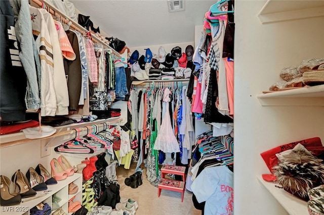 spacious closet featuring carpet floors and visible vents