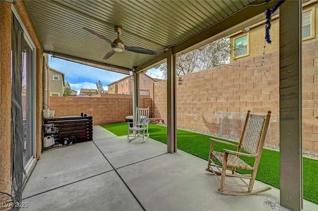 view of patio / terrace with ceiling fan and a fenced backyard