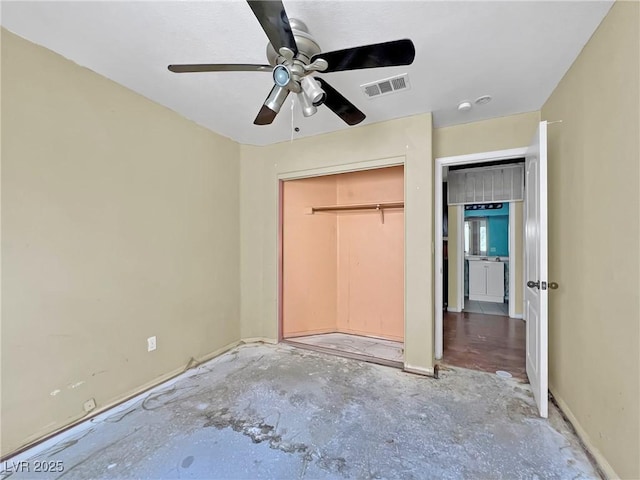 unfurnished bedroom with ceiling fan, visible vents, baseboards, a closet, and unfinished concrete floors