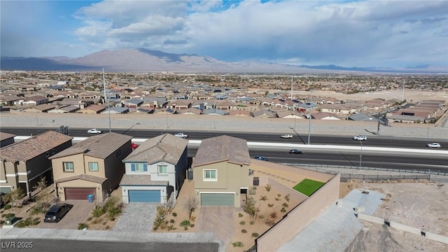 birds eye view of property featuring a residential view and a mountain view