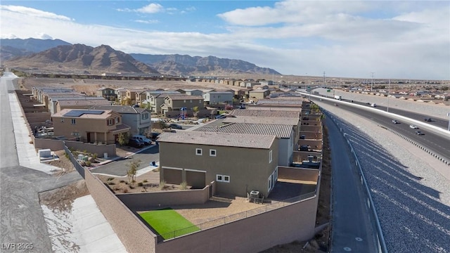 drone / aerial view with a mountain view and a residential view