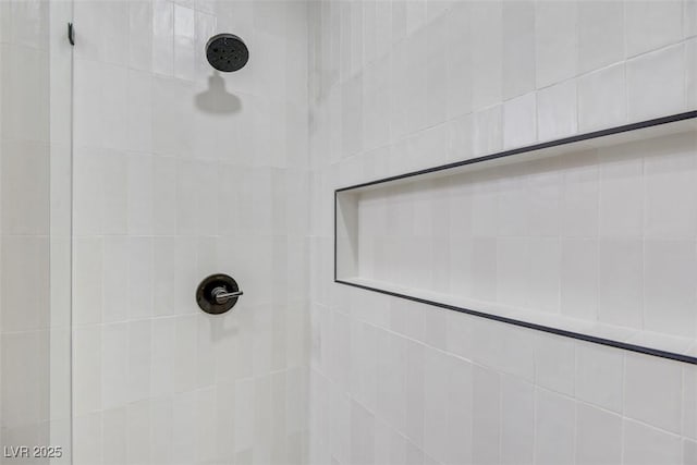 details with a tile shower