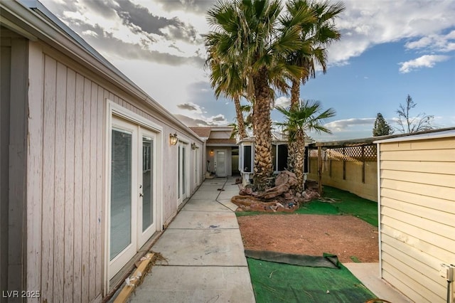 exterior space featuring fence and a patio