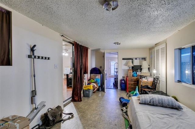 bedroom featuring a textured ceiling