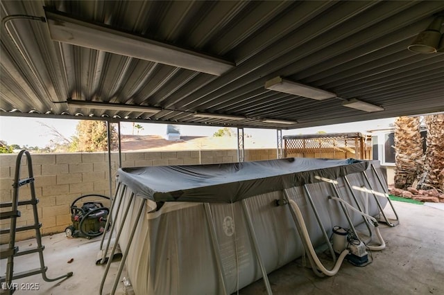 view of patio / terrace featuring a fenced in pool