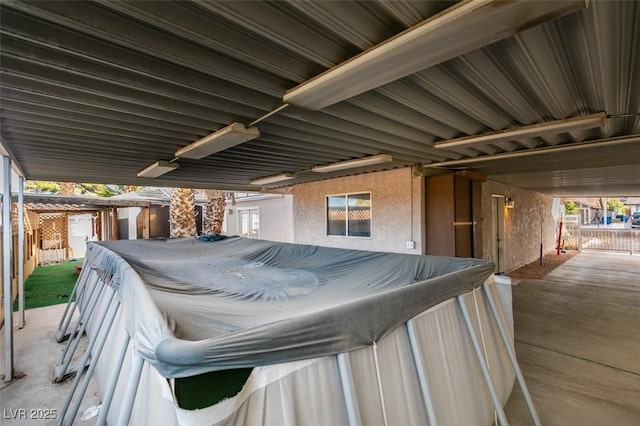 view of patio / terrace featuring a hot tub