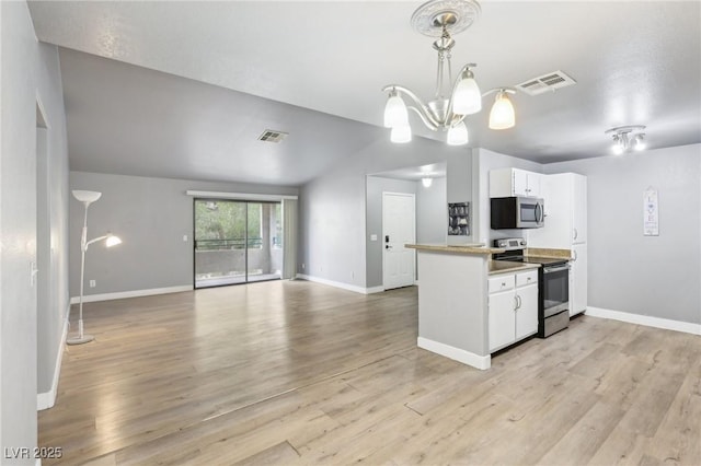 kitchen featuring white cabinetry, an inviting chandelier, visible vents, and appliances with stainless steel finishes