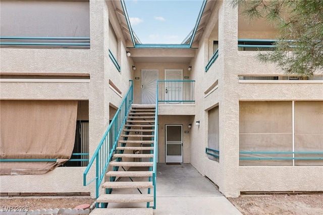 view of property with stairway