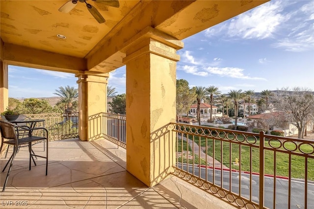 balcony featuring a ceiling fan