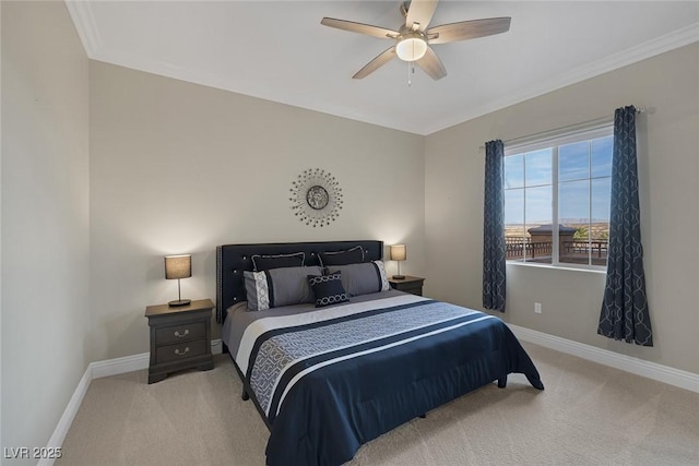 bedroom featuring carpet, baseboards, ceiling fan, and crown molding