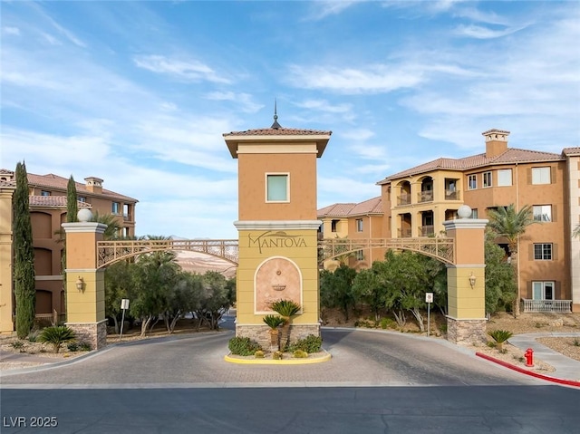 view of building exterior with driveway