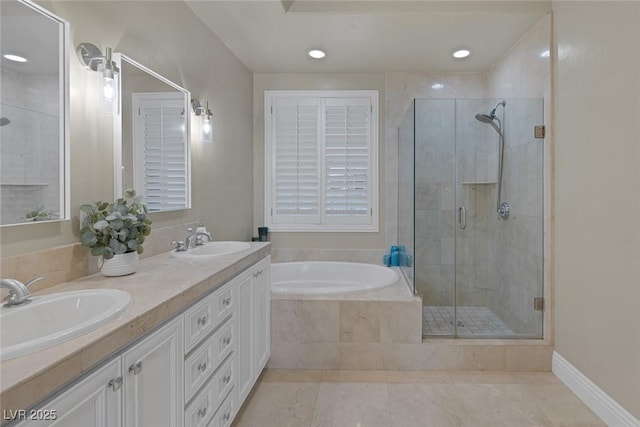 full bath with double vanity, a sink, a bath, and a shower stall