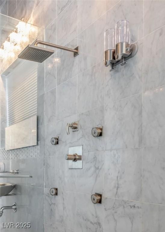 interior space with a tile shower