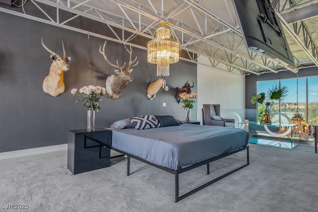 bedroom featuring carpet floors and baseboards