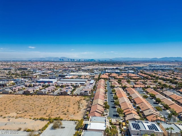 bird's eye view featuring a residential view and a mountain view