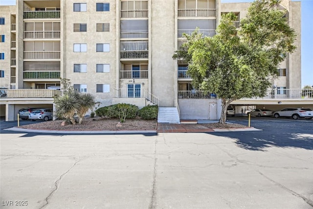 view of property with covered parking