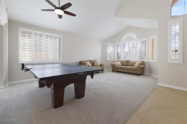 rec room featuring light carpet, a healthy amount of sunlight, ceiling fan, and lofted ceiling