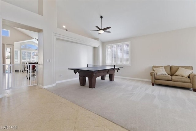 game room featuring high vaulted ceiling, carpet, a wealth of natural light, and baseboards