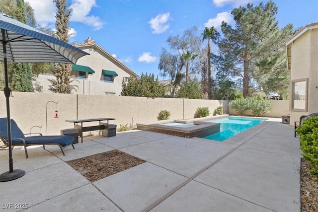 view of swimming pool with a patio area, a fenced backyard, and a fenced in pool