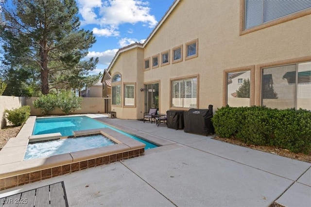 view of pool with a fenced in pool, a patio, a fenced backyard, grilling area, and an in ground hot tub