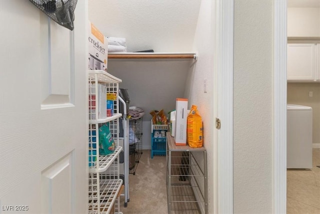 storage area with washer / clothes dryer