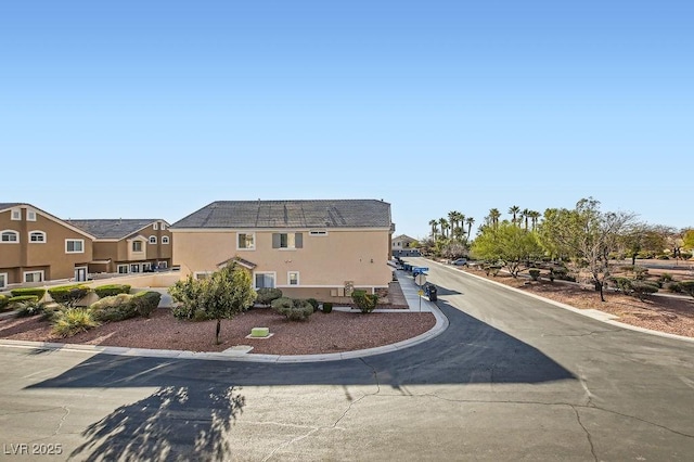 view of front of home featuring stucco siding