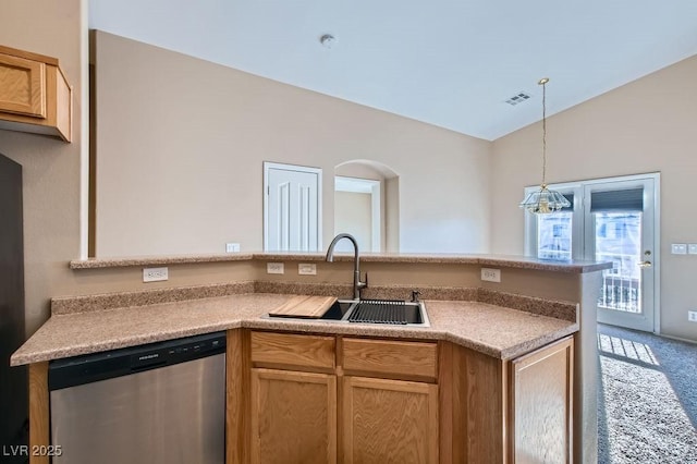 kitchen with visible vents, lofted ceiling, a sink, dishwasher, and carpet flooring