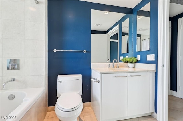 bathroom featuring visible vents, toilet, tile patterned flooring, baseboards, and vanity