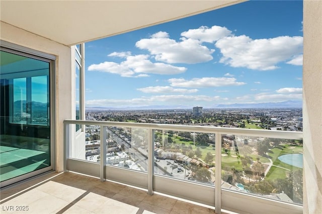 balcony featuring a city view